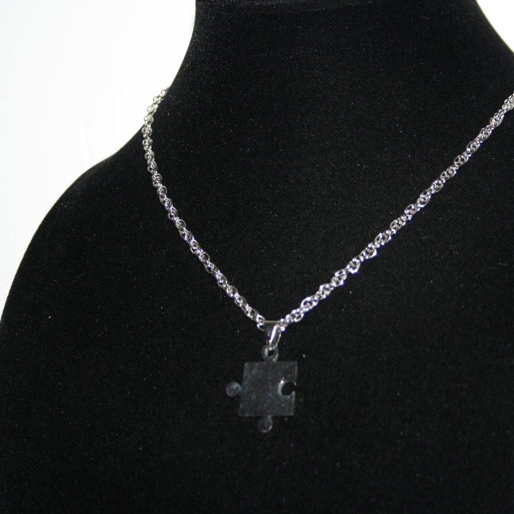 Silver puzzle piece necklace 18"